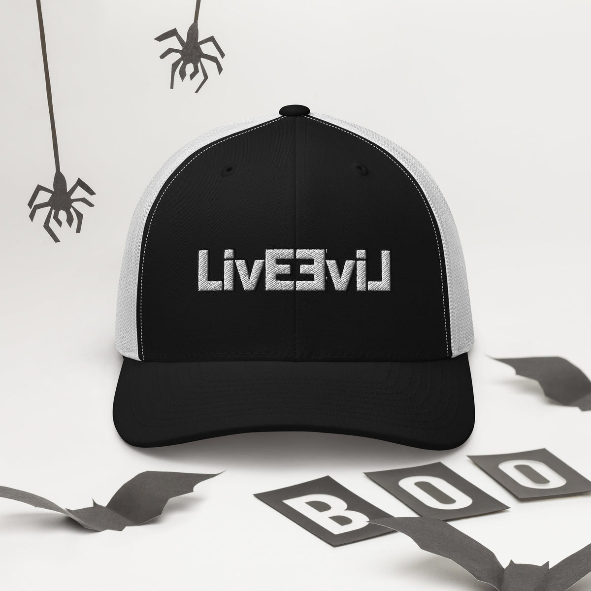 LivEƎvi⅃ trucker cap in black and white, alternate front view